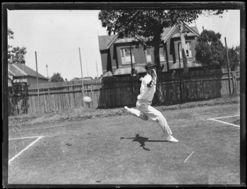 H. Betts just missing a shot during a tennis game, Strathfield, New South Wales, ca. 1930s [picture]