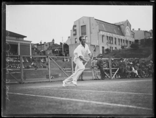 W.B. Walker running to hit a forehand shot during a tennis game, New South Wales, ca. 1930s [picture]