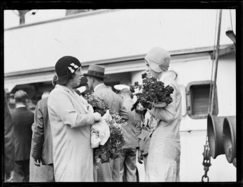 Mrs Bavin and Miss Valerie Bavin holding bouquets of flowers, New South Wales, ca. 1930s, 1 [picture]