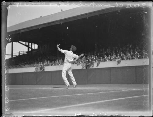 Tennis player R.O. Cummings serving the ball at the State Championships, New South Wales, 29 April 1927 [picture]