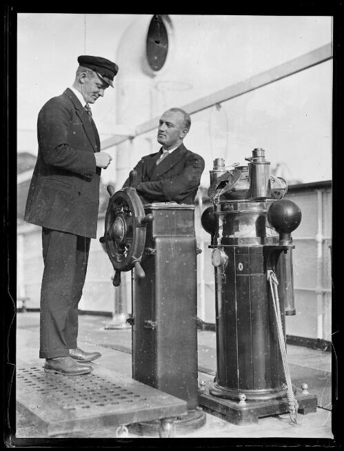 Captain Christensen and a crew member on the bridge of the motor ship Triton, New South Wales, 19 August 1930 [picture]