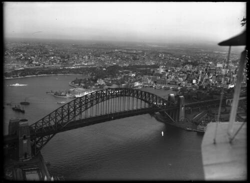 Bridge in shadow in F.G. [aerial view] [picture] : [Sydney Harbour Bridge, Sydney, New South Wales] / [Frank Hurley]