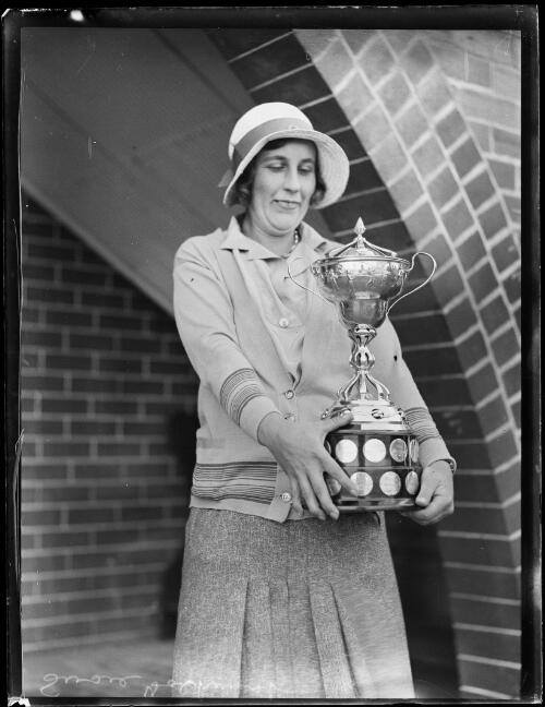 Miss Susie Tolhurst golfer holding a trophy, New South Wales, ca. 1930s [picture]