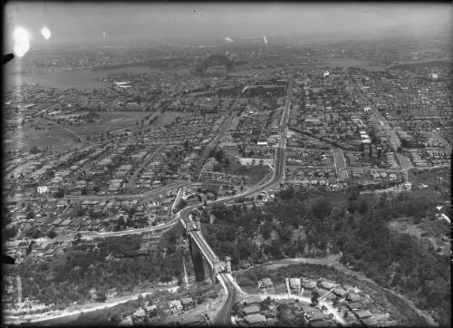 Looking towards city from above Suspension Bdge [i.e. Bridge], Cammeray [aerial view] [picture] : [Sydney, New South Wales] / [Frank Hurley]