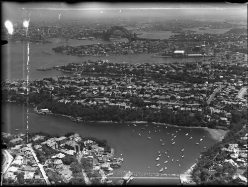 Looking towards city from Mosman B. [i.e. Mosmans Bay] [picture] : [Aerial views, Sydney, New South Wales] / [Frank Hurley]