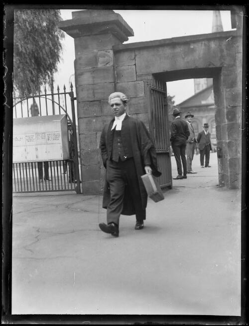 Mr Mitchell, King's Council, in wig and gown, with St James' Church in the background, Sydney, New South Wales, ca. 1920s [picture]