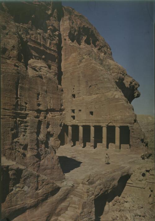 [Narrow cloister behind a row of plain-topped columns, The Urn Tomb, Petra] [picture] / [Frank Hurley]