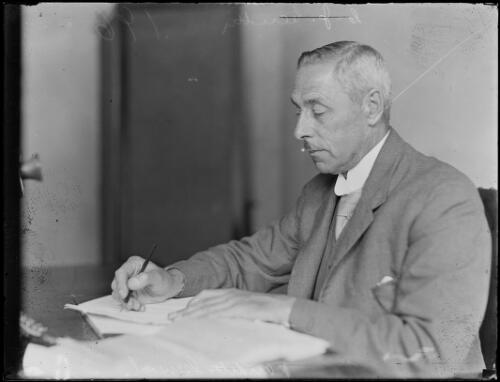Auditor-General Charles John Cerutty at his desk, New South Wales, 15 March 1930 [picture]