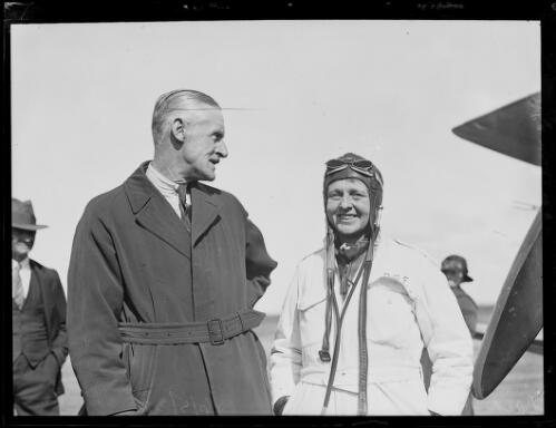 Lady Isobel Chaytor talking with man after arriving in her plane, New South Wales, 6 May 1932 [picture]