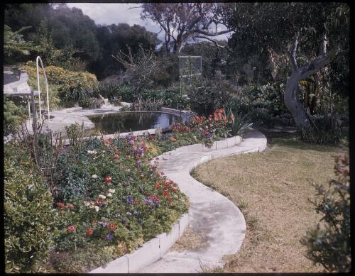 [Garden with pond and flowers, Bright, Victoria?] [transparency] / [Frank Hurley]
