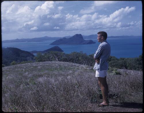 [Unidentified man looking at Pentecost Island, Whitsundays, Queensland] [transparency] / [Frank Hurley]