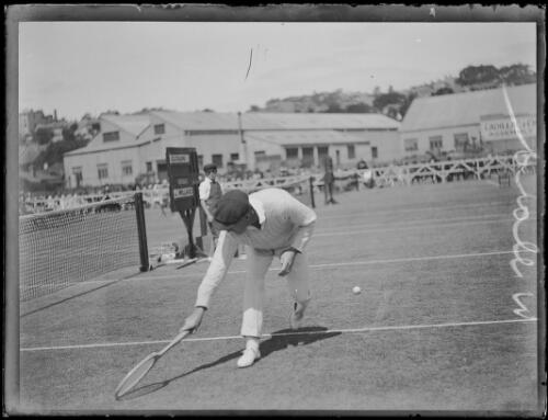 Tennis player J. Willard after missing a low forehand shot, New South Wales, ca. 1930 [picture]