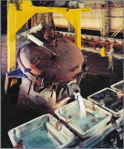 Pouring alumina into ingot-forms, Alcoa works at Point Henry near Geelong, 1970 [picture] / Wolfgang Sievers