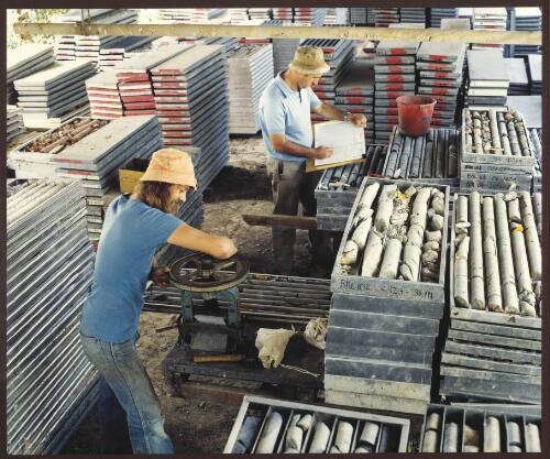 Shell geologists, Imre Hillenbrand (foreground) and Dick Wright in the core library in the Orange region, New South Wales, 1980, 2 [picture] / Wolfgang Sievers
