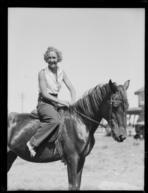 Swimmer Miss Pat Norton on a horse, New South Wales, 16 January 1934 [picture]
