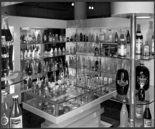Display of glass bottles produced by ACI, Australian Glass Manufacturers, Melbourne, Victoria, 1961 [picture] / Wolfgang Sievers