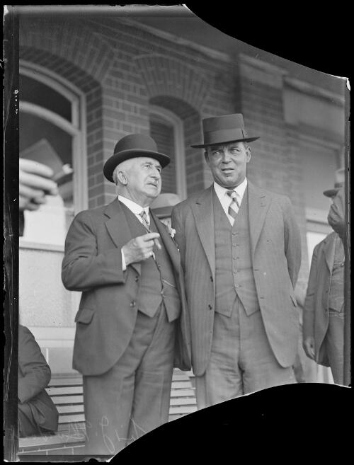 Sir James Anderson Murdoch and T.J. Jamieson outside a building, New South Wales, 2 January 1933 [picture]