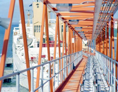 Cable gantry running out to a ship, Tasman Cable Company, Botany, New South Wales, 1990 [2] [picture] / Wolfgang Sievers