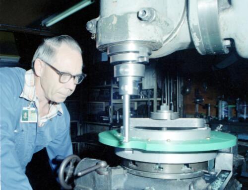 Unidentified employee using machinery at ACI Glendor Engineering, Burwood, Victoria, 1981 [picture] / Wolfgang Sievers