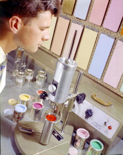 Unidentified employee colour sampling at Balm Paints [picture] / Wolfgang Sievers