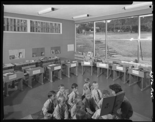 Teacher and students in a classroom, Peninsula School, Mt. Eliza, Victoria 1960, architects Bates, Smart and McCutcheon [picture] / Wolfgang Sievers