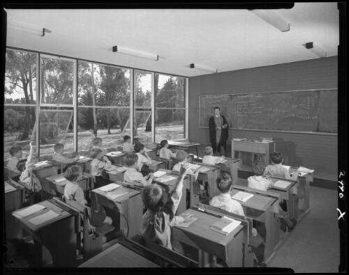 Teacher and students in a classroom, Peninsula School, Mt. Eliza, Victoria 1961, architects Bates, Smart and McCutcheon [2] [picture] / Wolfgang Sievers