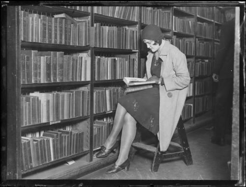 Woman reading in the Municipal Library, New South Wales, 20 June 1930 [picture]