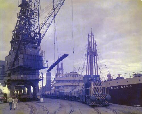 Loading the 'Iron King' at an unidentified  wharf, Victoria [picture] / Wolfgang Sievers