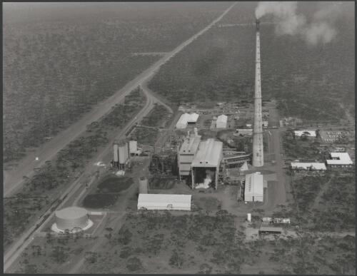 Aerial view of Western Mining plant with chimney stack, Kambalda, WA, 1973 [picture] / Wolfgang Sievers