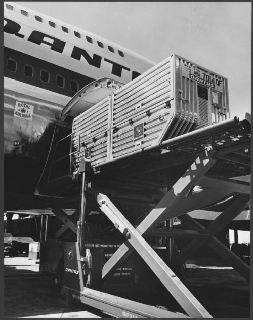 Qantas air freight [container being moved], Mascot Airport, Sydney [ca. 1974] [picture] / Wolfgang Sievers