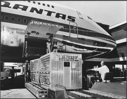 Qantas air freight [containers being loaded], Mascot Airport, Sydney [ca. 1974] [picture] / Wolfgang Sievers