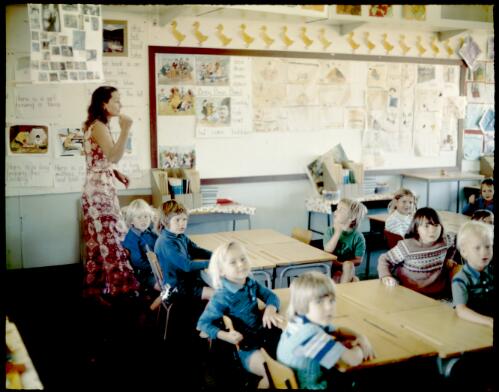 [Teacher and small children in a classroom at Tom Price, Western Australia, 1975 ] [transparency] / Wolfgang Sievers