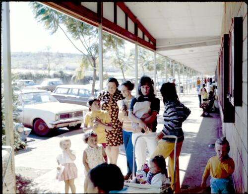 [Women and children  in the street, Tom Price, Western Australia, 1975 ] [transparency] / Wolfgang Sievers