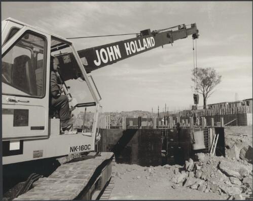 Heavy equipment used in construction for dam wall, John Holland Constructions, Googong Water Treatment Plant, N.S.W., 1977, [picture] / Wolfgang Sievers