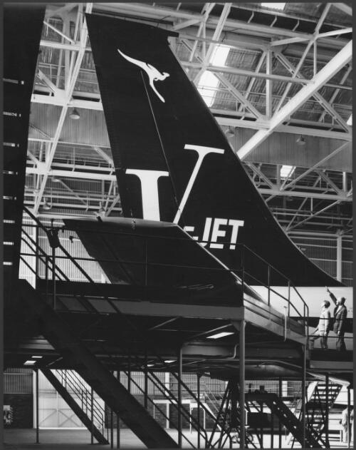 [Tail of Qantas Boeing 707 V-jet aircraft in] Qantas workshop hangar, Mascot, New South Wales, 1961 [picture] / Wolfgang Sievers