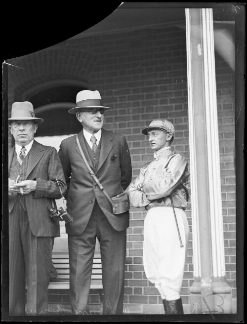 Alan Louisson owner of racehorse Nightmarch with jockey Roy Reed, New South Wales, 10 October 1932 [picture]