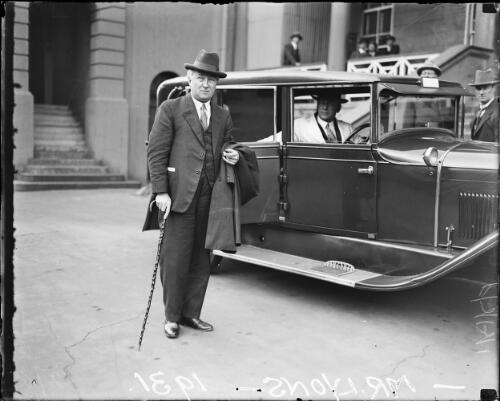 Leader of the United Australia Party Joseph Lyons standing beside a car, New South Wales, 1931 [picture]