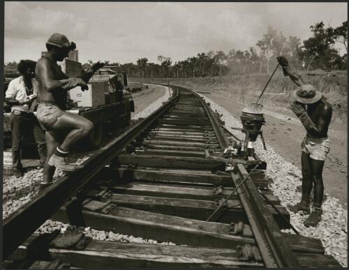 Aboriginal and Torres Strait Island workers at the rail construction for Comalco bauxite, near Weipa, Cape York, NQ, 1971 [picture] / Wolfgang Sievers