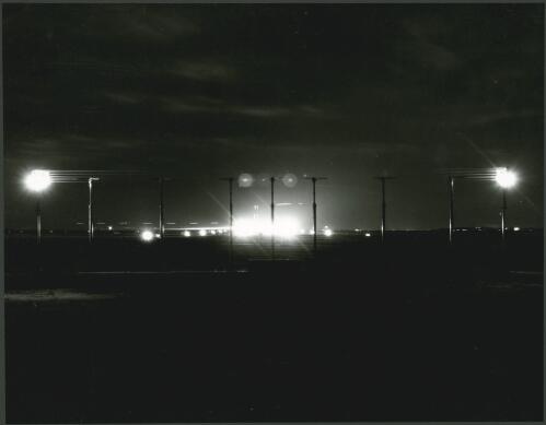 Civil aviation, night shot of runway at Essendon Airport, Victoria, 1957 [picture] / Wolfgang Sievers