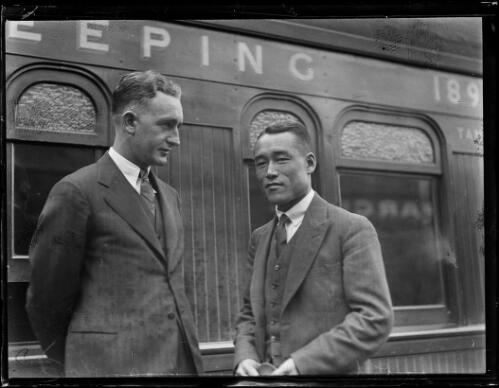Australian tennis player Jack Crawford and Japanese tennis player Jiro Sato next to a train at Central Station, Sydney, 19 January 1932 [picture]