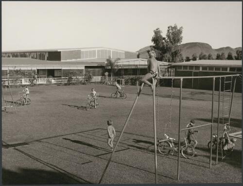 Children playing in the school yard at Tom Price, Western Australia, 1975 [picture] / Wolfgang Sievers