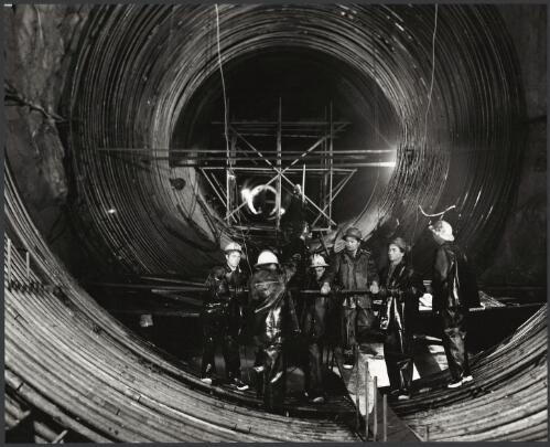 Workers at the Snowy Mountains Scheme during tunnel construction, 1957 [picture] / Wolfgang Sievers