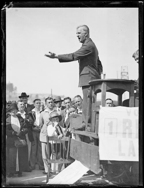 Prime Minister James Scullin addressing a crowd from a back tray of a truck at Coogee, New South Wales, 14 December 1931 [picture]