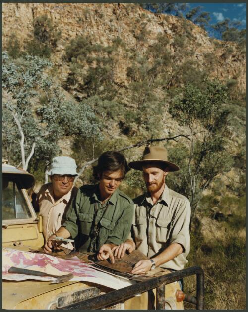 Shell's geological exploration team checking survey maps in the Mount Isa region, Queensland, 1979, 2 [picture] / Wolfgang Sievers