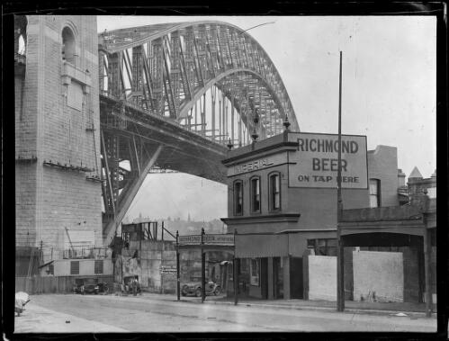 Sydney Harbour Bridge and the Imperial Hotel in North Sydney, ca. 1932 [picture]