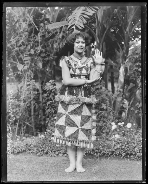 Princess Elisiva Fusipala Tauki'onetuku of Tonga standing in a garden, New South Wales, ca. 1930 [picture]