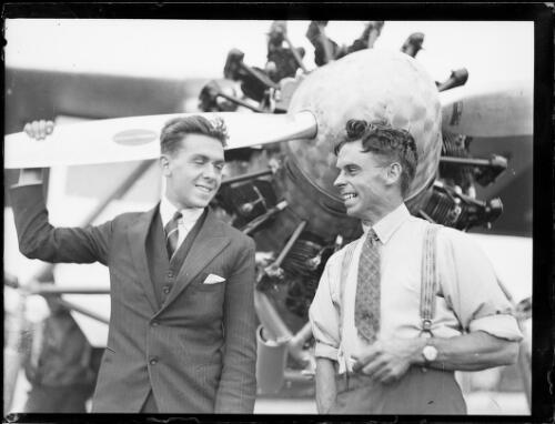 Aviators Keith Smith and Walter Shiers in front of their plane, Mascot, Sydney, 15 March 1930 [picture]