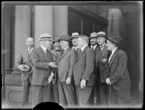 Men crowded around Sir Edgar Bertram Mackennal at reception in his honour , New South Wales, ca. 1926, 1 [picture]