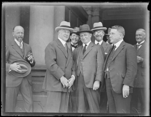 Men crowded around Sir Edgar Bertram Mackennal at reception in his honour , New South Wales, ca. 1926, 2 [picture]