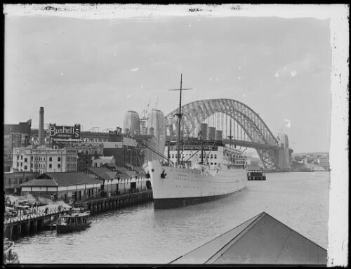 P&O liner Strathnaver docked at Circular Quay with Sydney Harbour Bridge in the background, Sydney, ca. 1932 [picture]